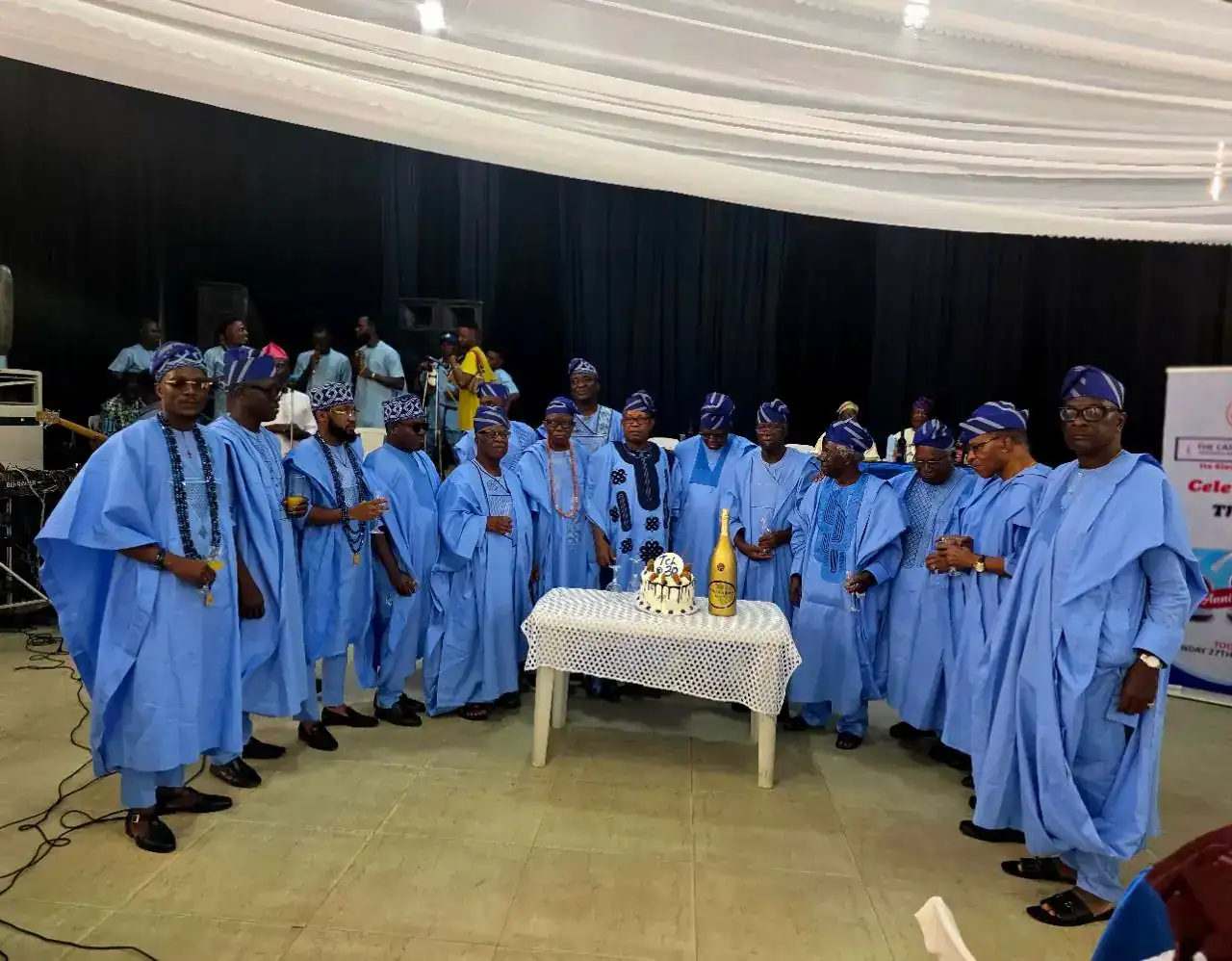 Members of The Cathedral League gathered around their anniversary cake in 2025