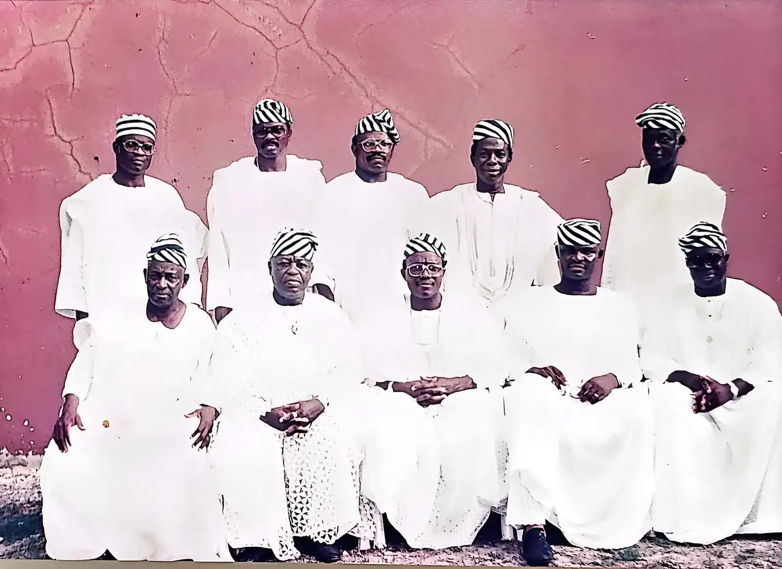 League members seated and standing together outdoors for a group photograph