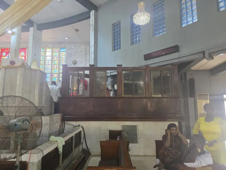 The Cathedral interior with stained-glass windows, chandeliers and choir enclosure